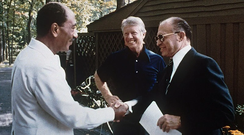 Andwar Sadat, Jimmy Carter, and Menachim Begin