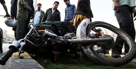 Mangled remains of a motorcycle from Raymond Davis case.